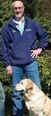 the owner, Pete Burgesswith his golden retriever