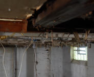 Damaged and rotten basement detail
