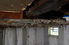 Damaged and rotten basement detail