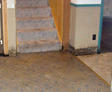 water damage in the basement with steps