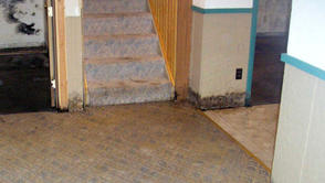 water damage in the basement with steps