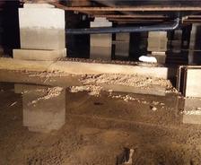 Flooding crawlspace with cinderblock