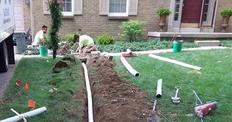 THBS crew installing downspouts