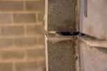 Closeup of bowing wall with gap