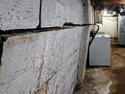 side view of bowing cinder block wall