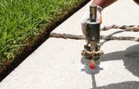 Poly injection on uneven exterior sidewalk.