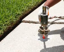 Poly injection on uneven exterior sidewalk.