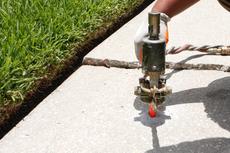 Poly injection on uneven exterior sidewalk.