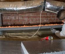 Crew installing ExTremeBloc in crawl space for humidity control
