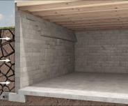 3D animation of dry soil pushing into a bowing wall in the basement.