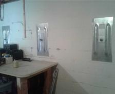 The finished product of the wall anchor on the cinderblock wall.