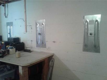 The finished product of the wall anchor on the cinderblock wall.