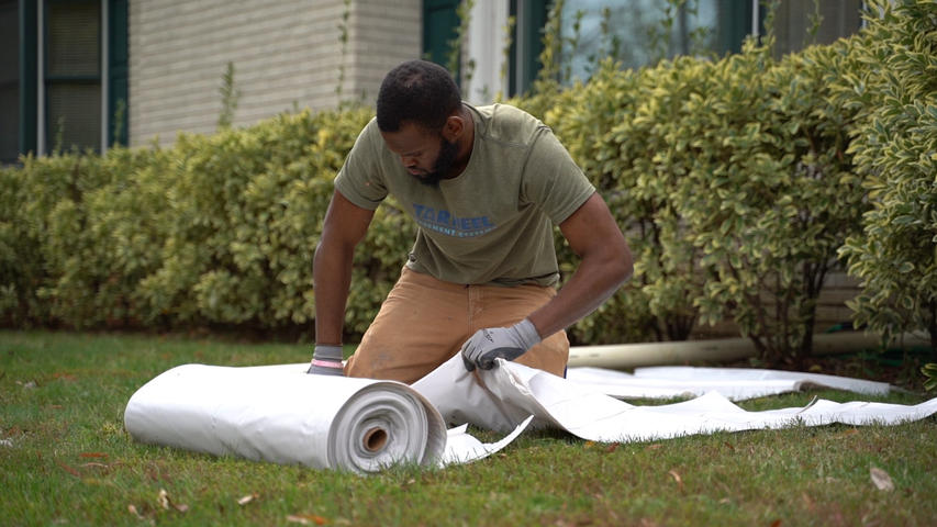 Tar Heel Basement System Crew with vapor barrier