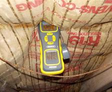 moisture meter in a crawl space
