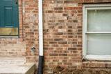 stair-step cracks in exterior brick wall