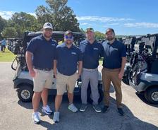 Employees from Tar Heel Basement Systems' Raleigh Branch participate in the Corinth Holders Pirate Booster Club Golf Tournament