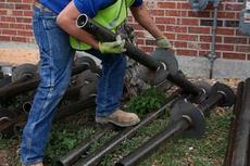 CFI prepping job site for helical piers installation