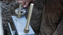 Close up tightening of pier screw