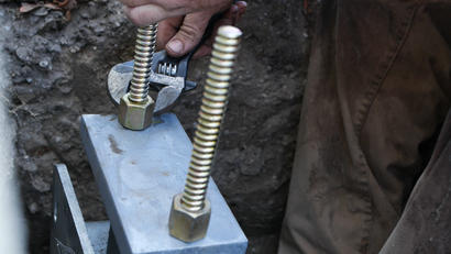 Close up tightening of pier screw