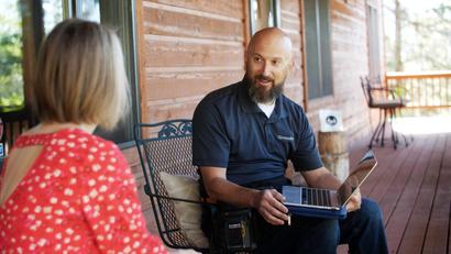 Inspection with homeowners on patio