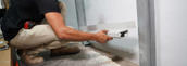 FRS Crew member installing interior drainage system