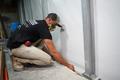 FRS Crew installing interior drainage system