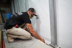 FRS Crew installing interior drainage system