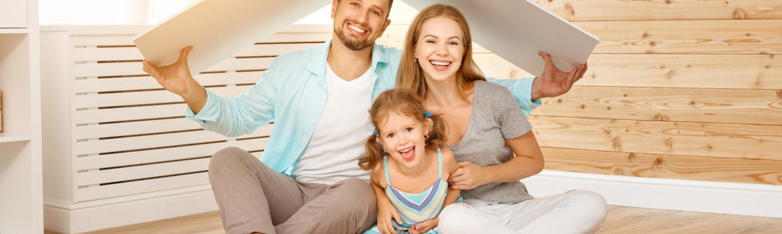 Family sitting together smiling