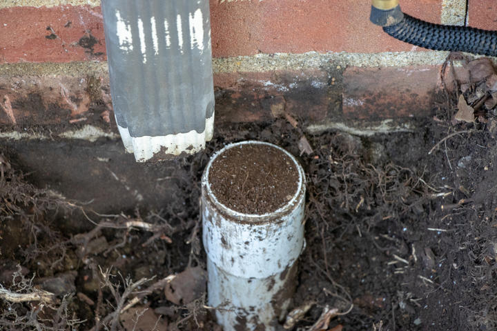 avoid clogged downspouts and gutters