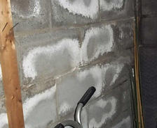 efflorescence on brick wall