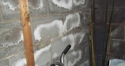efflorescence on brick wall
