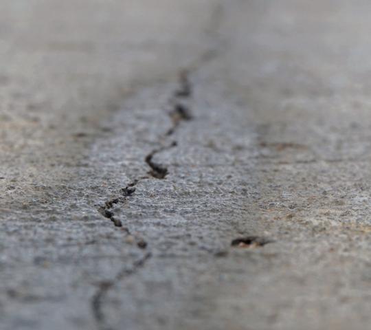 cracked and separating concrete