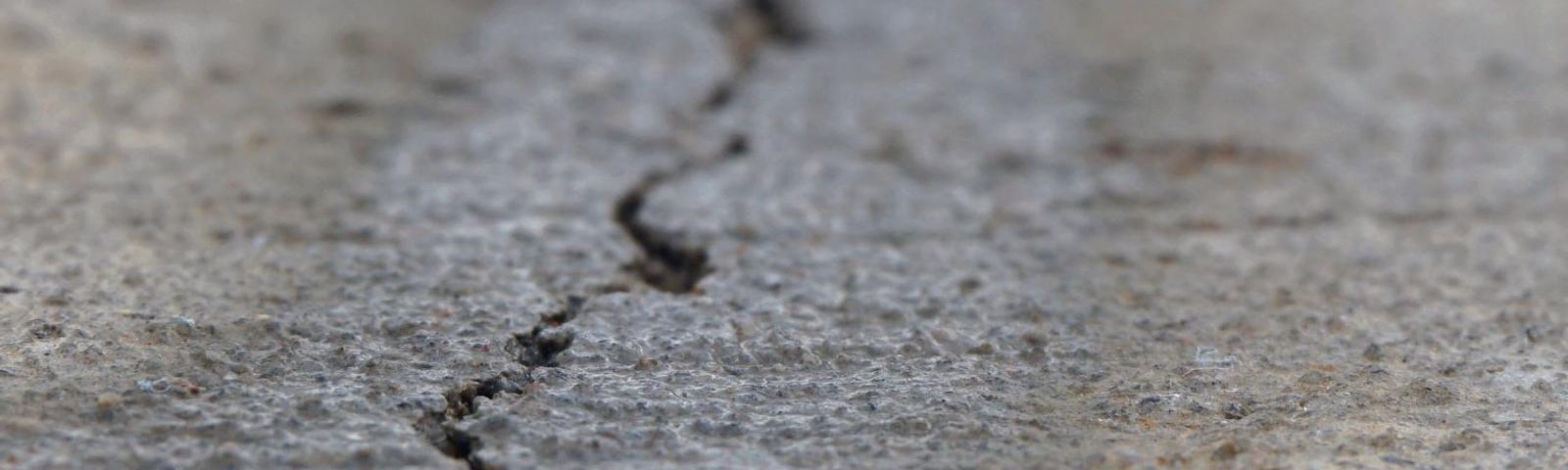 cracked and separating concrete