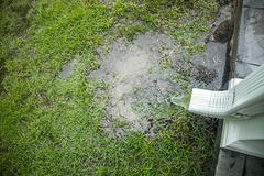 Standing water at base of downspout