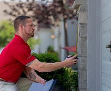 CFI measuring exterior of home