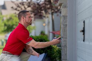 CFI measuring exterior of home