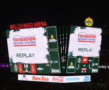 Arena scoreboard showing "Foundation Recovery Systems," with a game tied at 1-1 and time at 8:40.