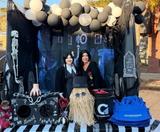 Two Foundation Recovery Systems Kansas City team members dressed in Adam's Family costumes at Lee's Summit Chamber of Commerce Trunk or Treat sponsorship event.