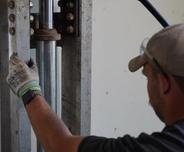crew member installing push piers