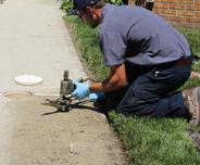 crew installing polyrenewal on sidewalk