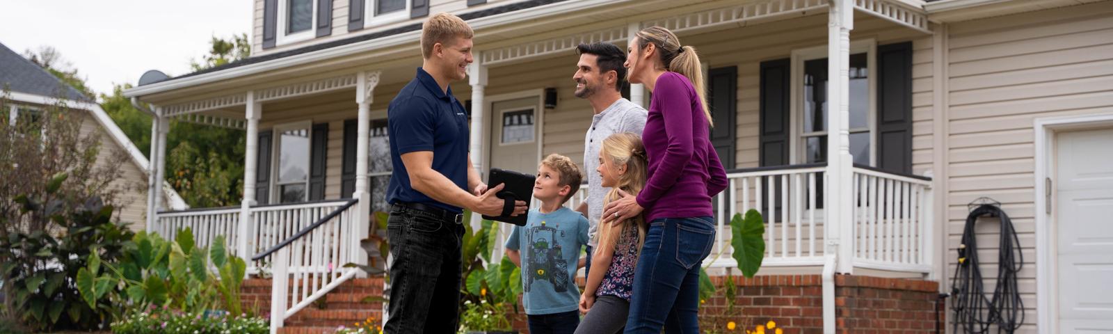 Indiana Foundation Service CFI with couple in front of home - Desktop Hero