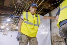 Mike Rowe in a basement