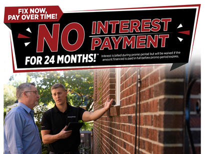 Two men talk outside near a brick wall; promo ad reads "No interest payment for 24 months.