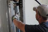 Crew installing push pier