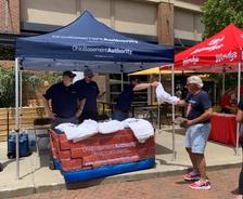 Ohio Basement Authority tent at the ESPN Cleveland Block Party