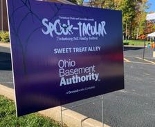 Ohio Basement Authority sponsorship sign at the Spook-tacular Fall Family Festival in Twinsburg