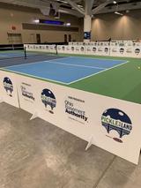 Ohio Basement Authority sponsorship signs at the annual Pickle in the Land pickleball tournament