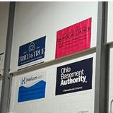 Ohio Basement Authority sign on display at Mars Hill Academy