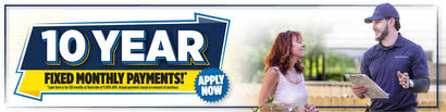 Banner advertising 10-year fixed monthly payments; a woman talks with a contractor holding a clipboard.